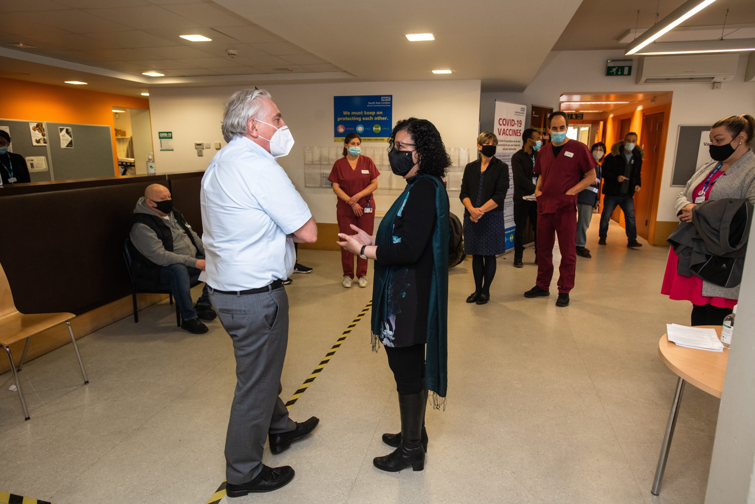 Cleo meeting Sir David Sloman, NHS Regional Director for London at a recent visit to the North Lewisham and Alliance PCN Covid Vaccination Hub at the Waldron Health Centre, to talk about her experiences of talking to people who are vaccine hesitant