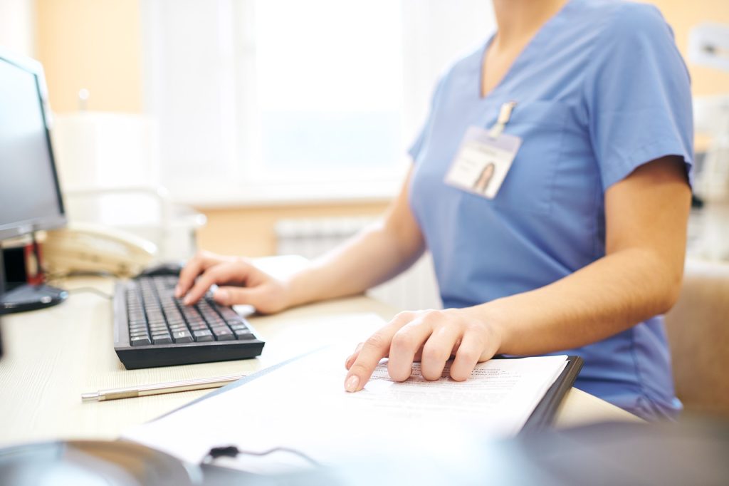 Clinician Using A Computer